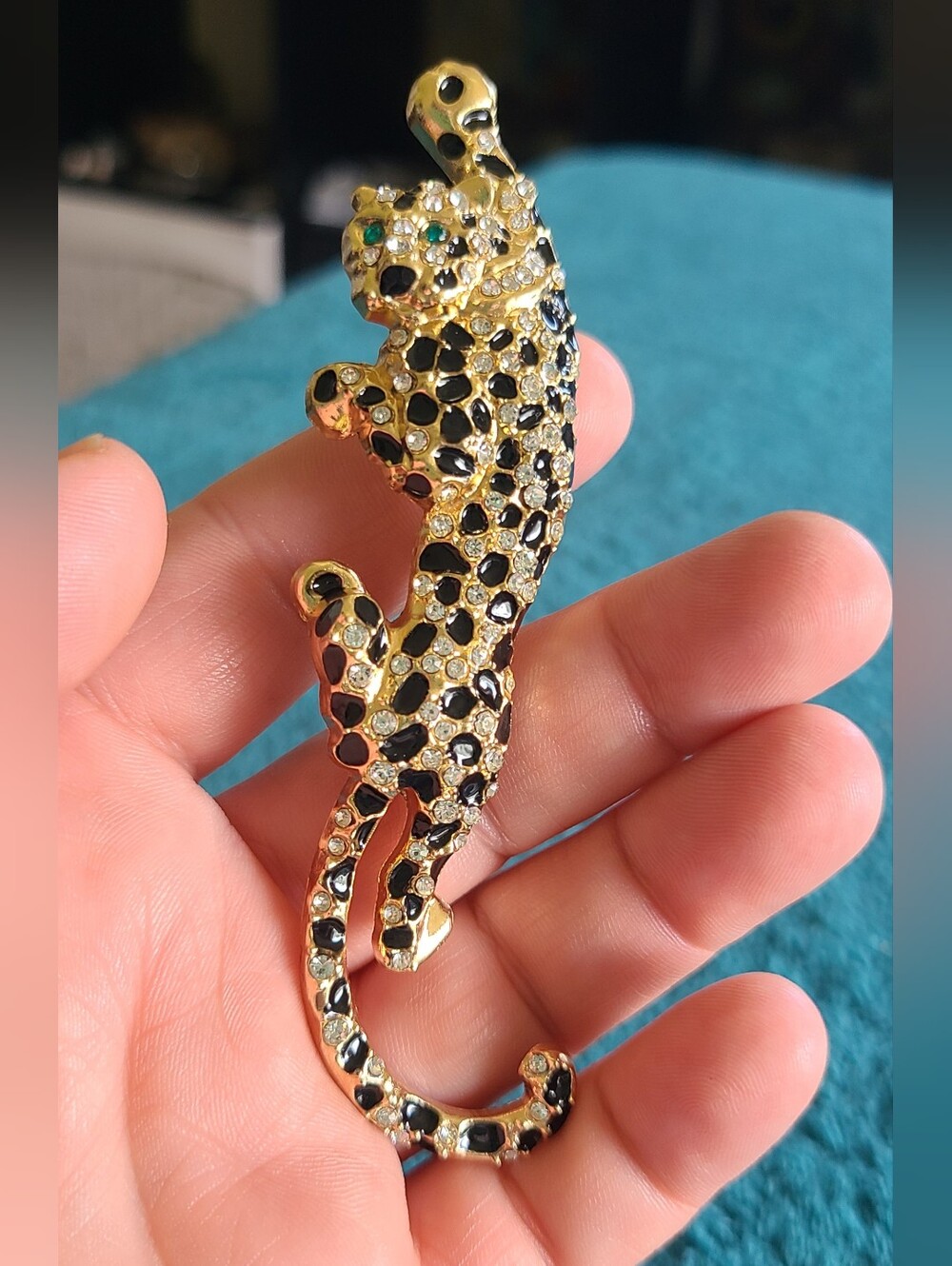 Vintage Gold-Tone Black and Clear Leopard Brooch with Green Eyes
